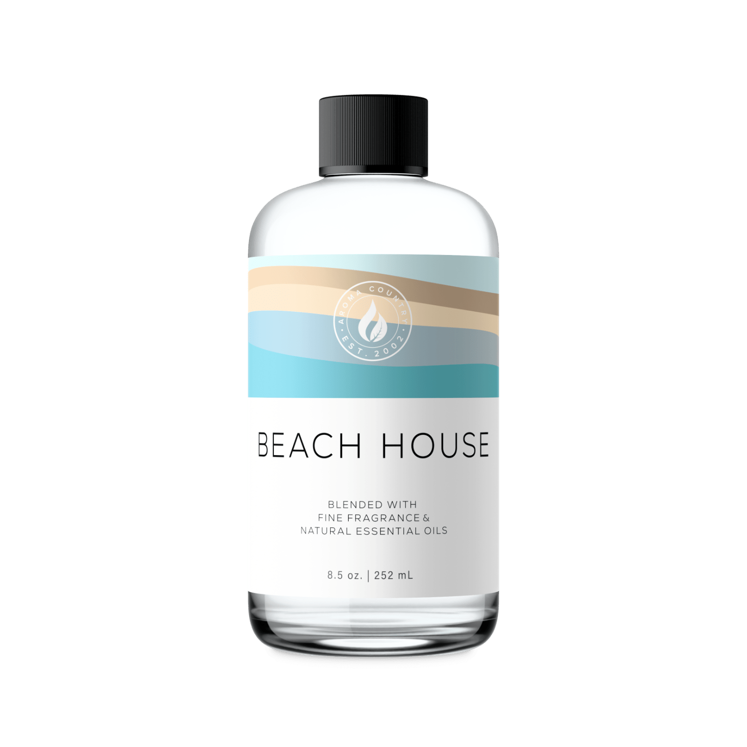 Beach House fragrance oil with soft ocean air notes light citrus and smooth coastal warmth creating a relaxed seaside atmosphere indoors