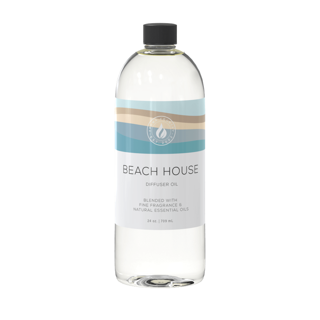 Beach House diffuser oil with coastal-inspired fragrance notes, crafted with natural essential oils for a breezy, ocean-air ambiance.