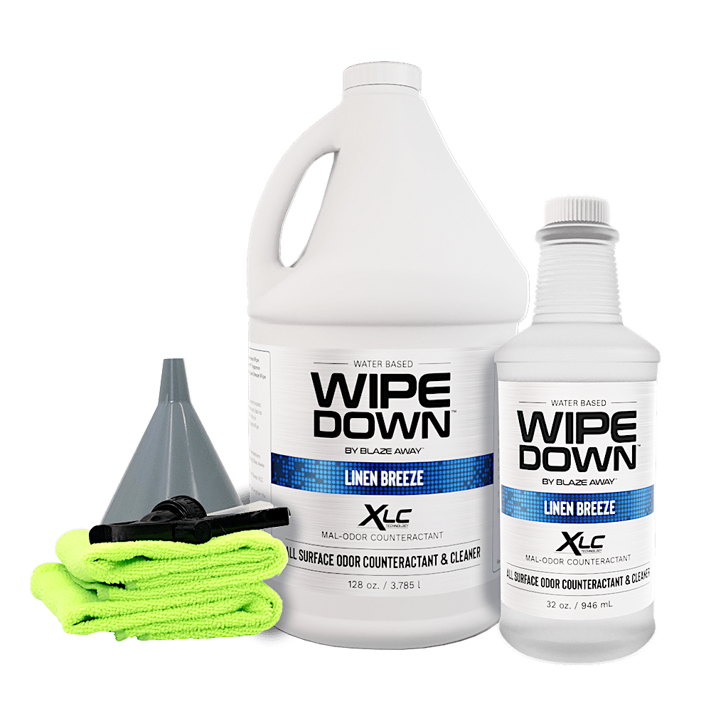 Linen Breeze Wipe Down odor control kit with 1-gallon cleaner, 32oz refill, microfiber cloths, sprayer, and funnel for multi-surface freshness.