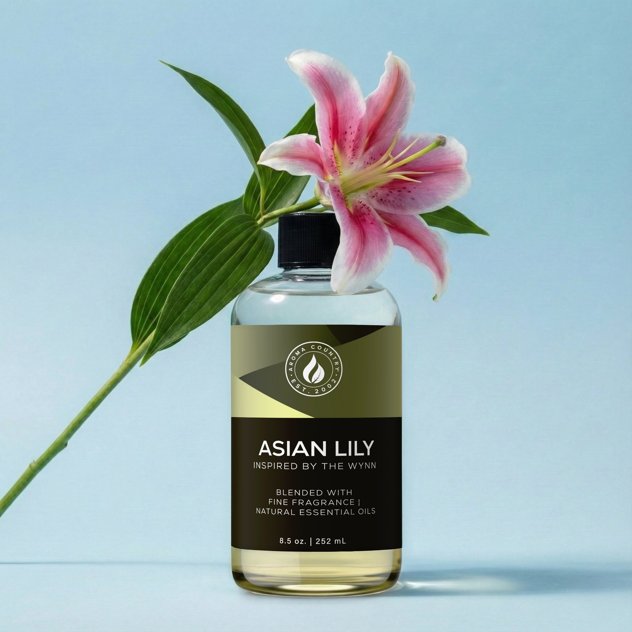 Asian Lily diffuser oil from the Inspired Collection, capturing the serene elegance of luxury hotel fragrance through refined floral home scenting.