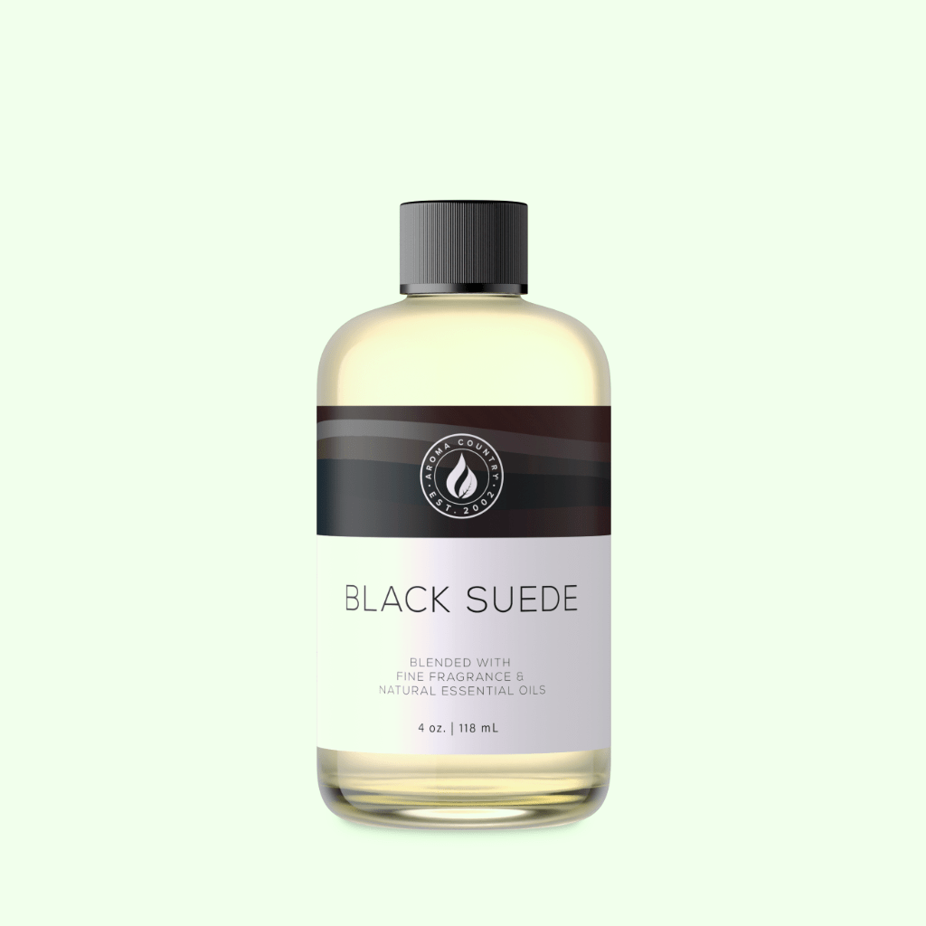 A 4 oz bottle of Black Suede fragrance oil featuring polished suede aroma with soft musky undertones and a sophisticated woody finish for refined home scenting