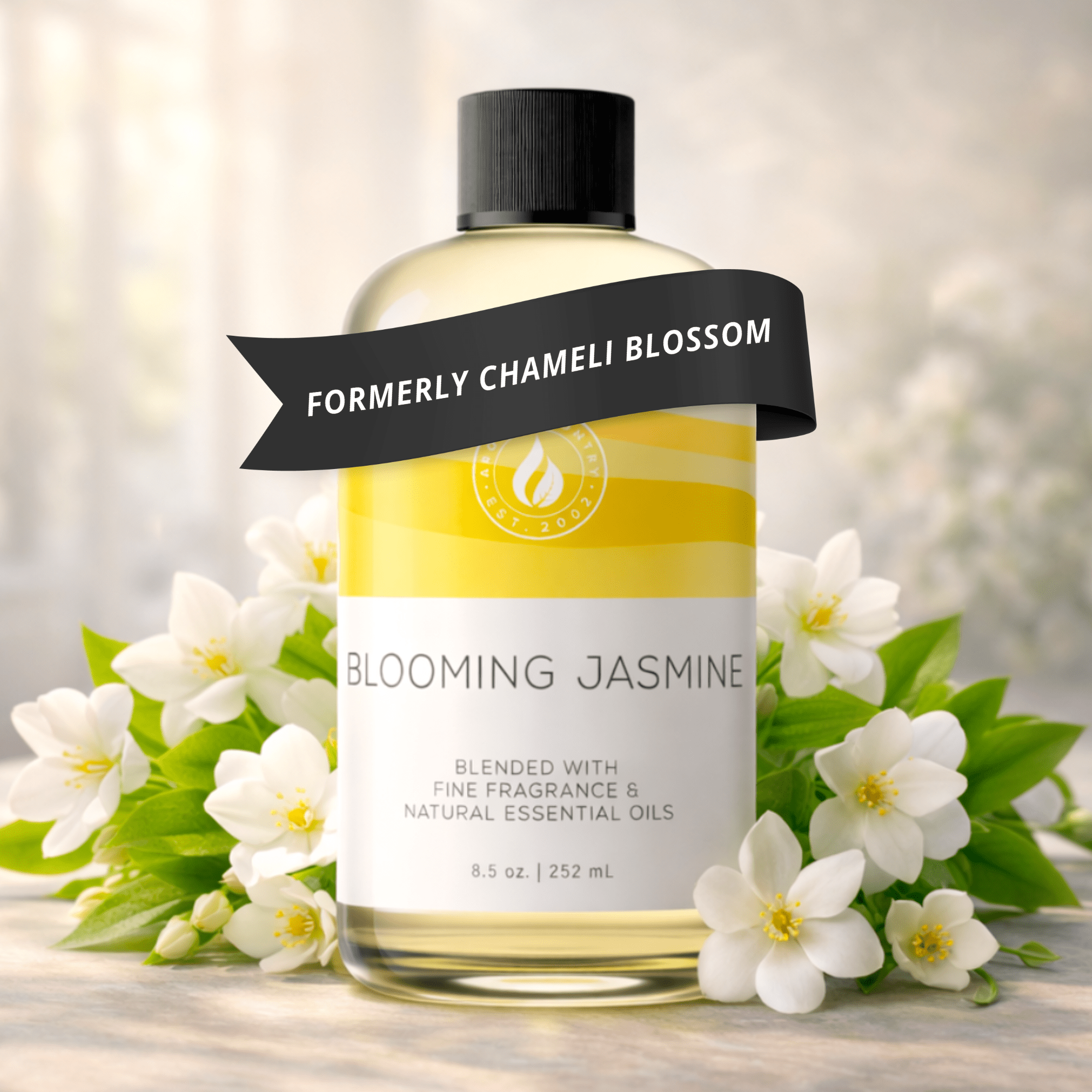 Blooming Jasmine fragrance oil at 8.5 oz, formerly known as Chameli Blossom, featuring sweet white jasmine character with honeyed petal warmth and lush floral depth for whole-room scenting