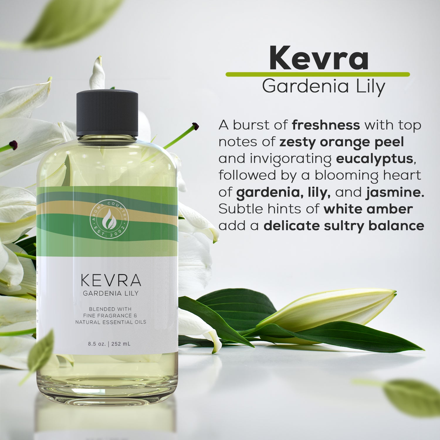 Kevra Gardenia Lily fragrance oil bottle surrounded by lilies, featuring notes of orange peel, eucalyptus, jasmine, and white amber.