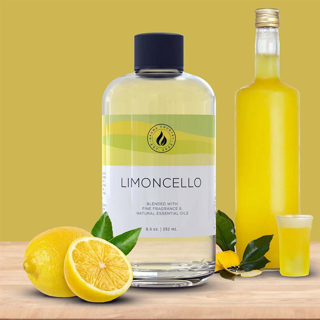 Limoncello diffuser oil in an 8.5 oz bottle surrounded by fresh lemons and a glass bottle of limoncello, capturing the scent of zesty citrus and sunlit freshness.